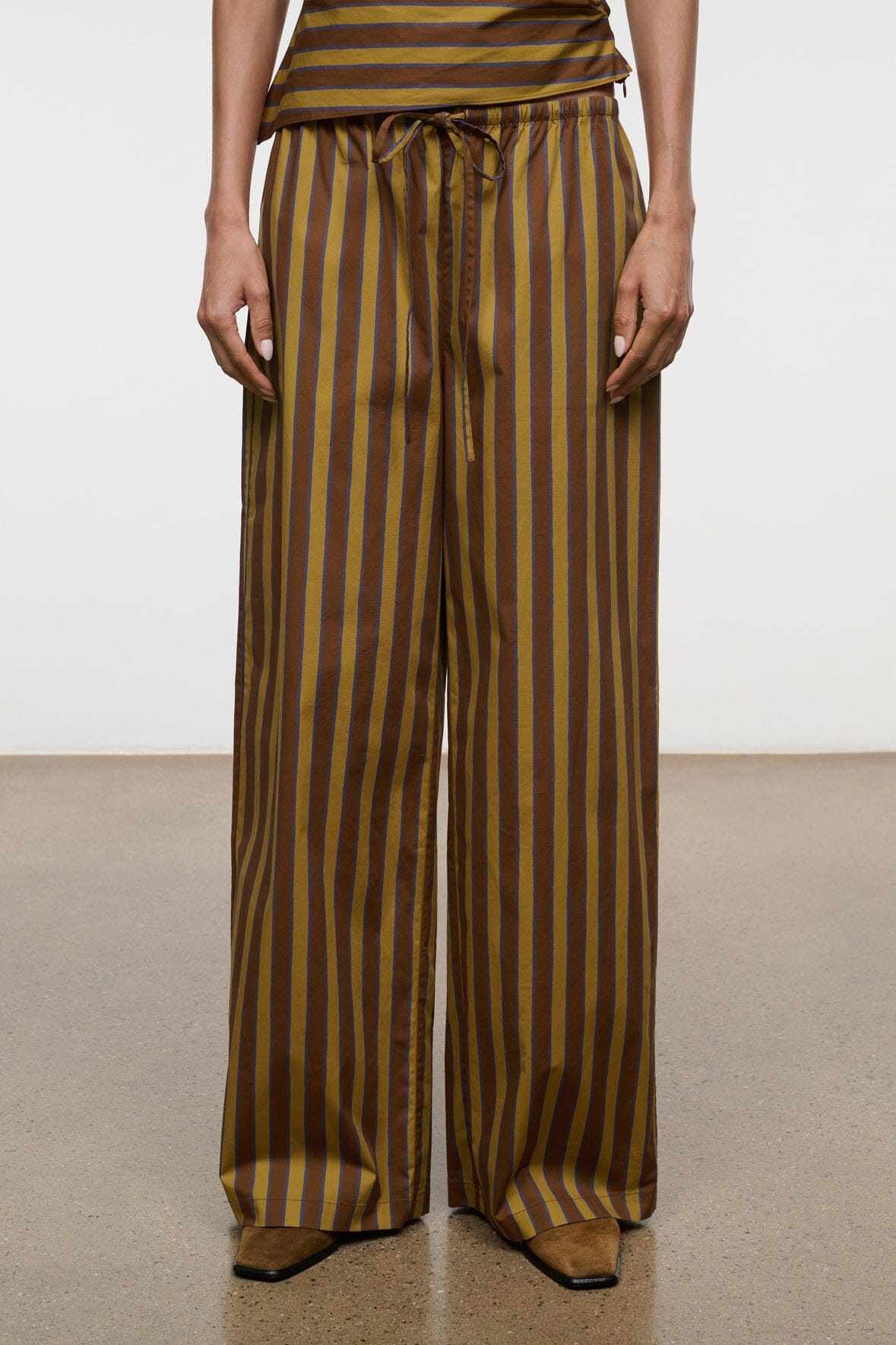 Wide-leg striped pants with drawstring waist, vertical brown and teal stripes