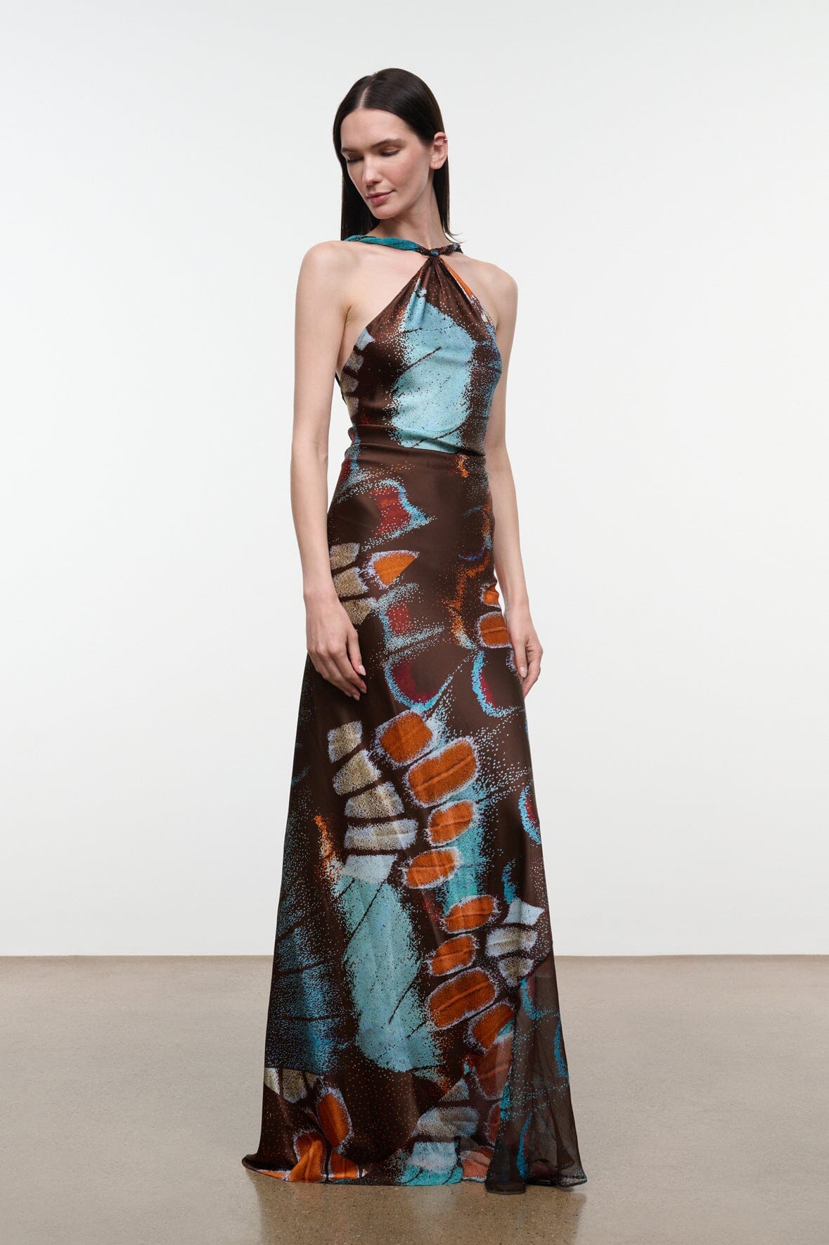 Silk halter maxi dress with abstract butterfly print, sleeveless, halter neckline tie