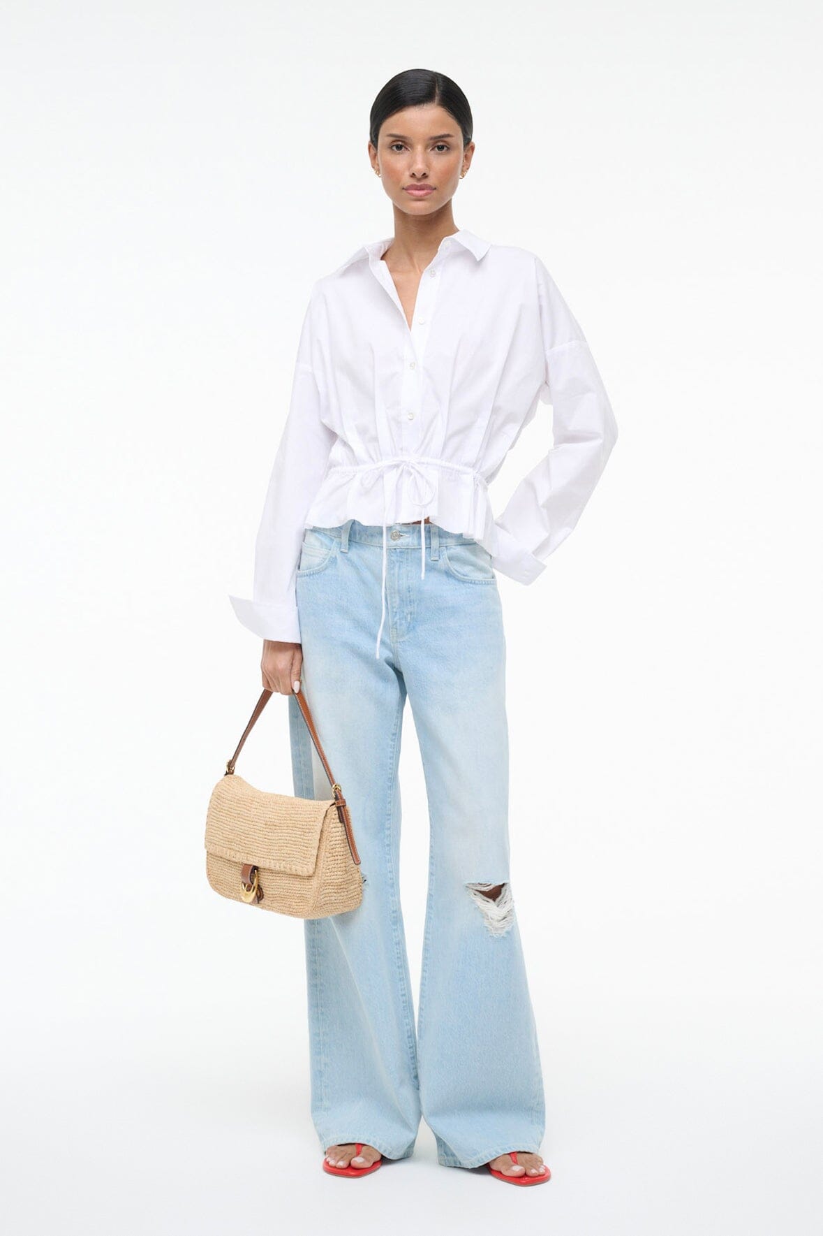 White PRIMROSE shirt with tied front waist, long sleeves, and pointed collar