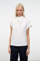 Ivory high-neck top with wide short sleeves, relaxed silhouette