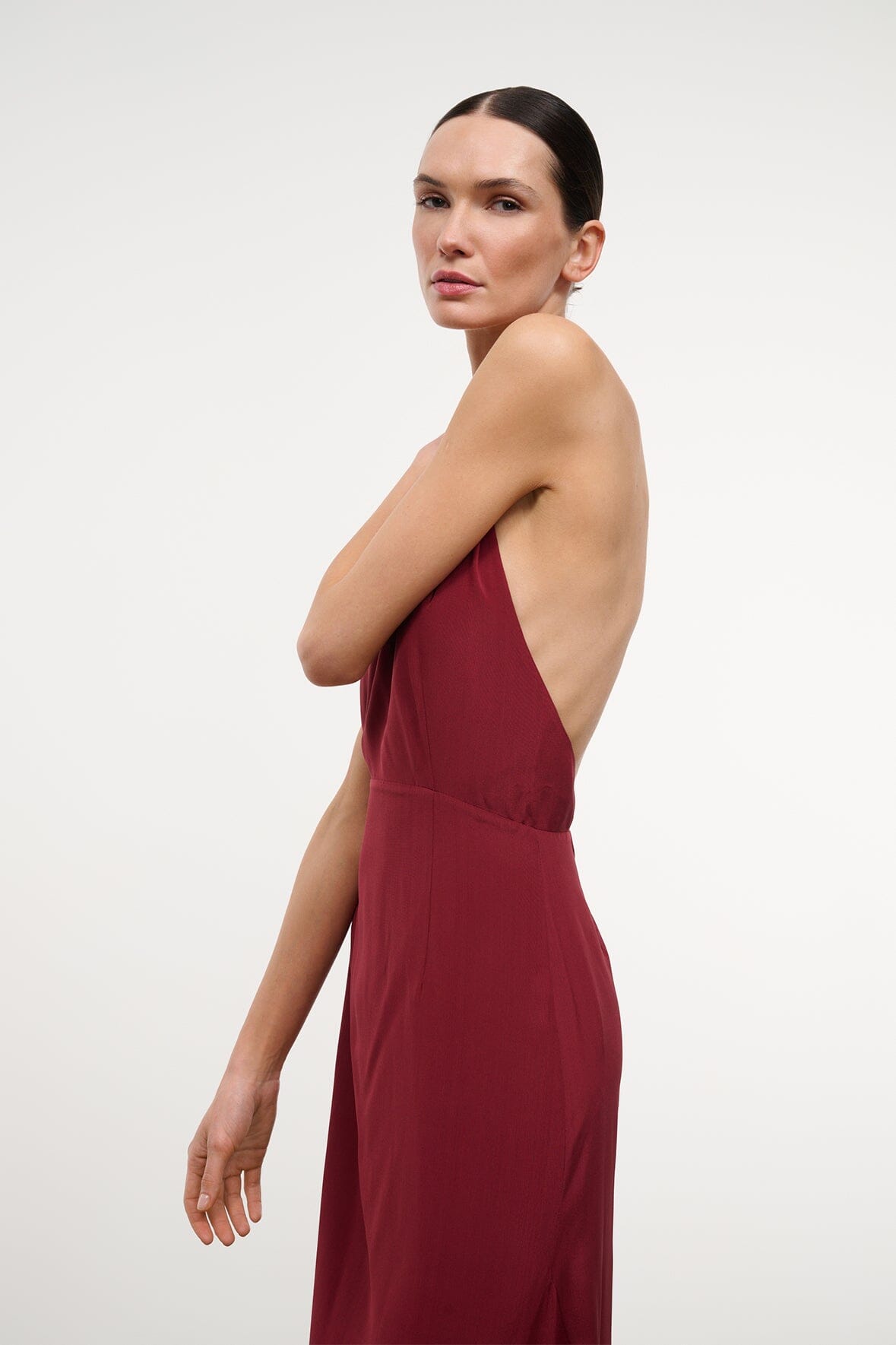Silk halter dress dark red with open back and flowing skirt