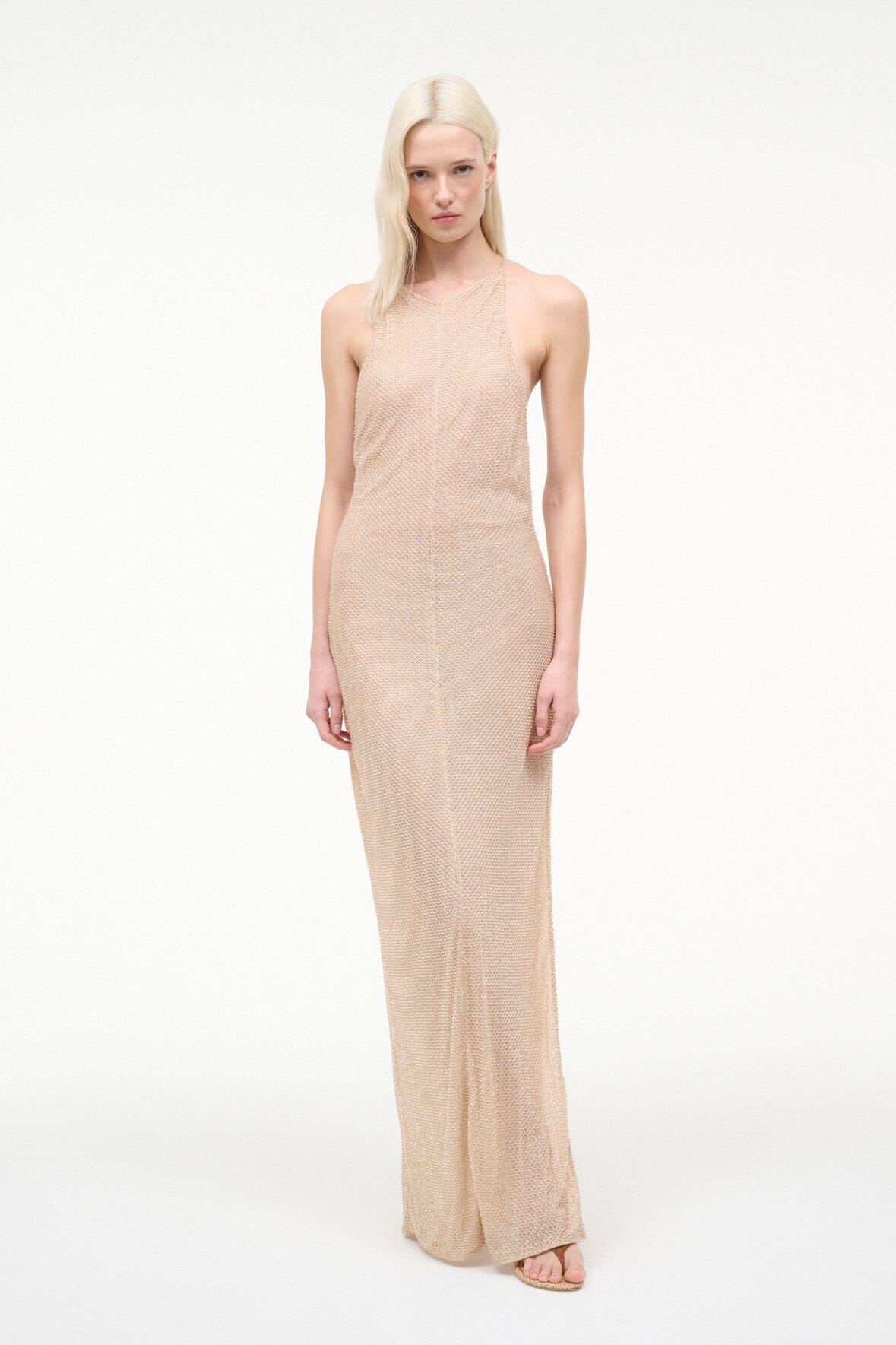 Champagne halter maxi dress with fitted shape and long side slit