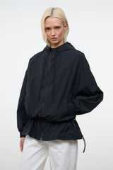 Black hooded wind jacket with full sleeves, cinched waist, drawstring hem
