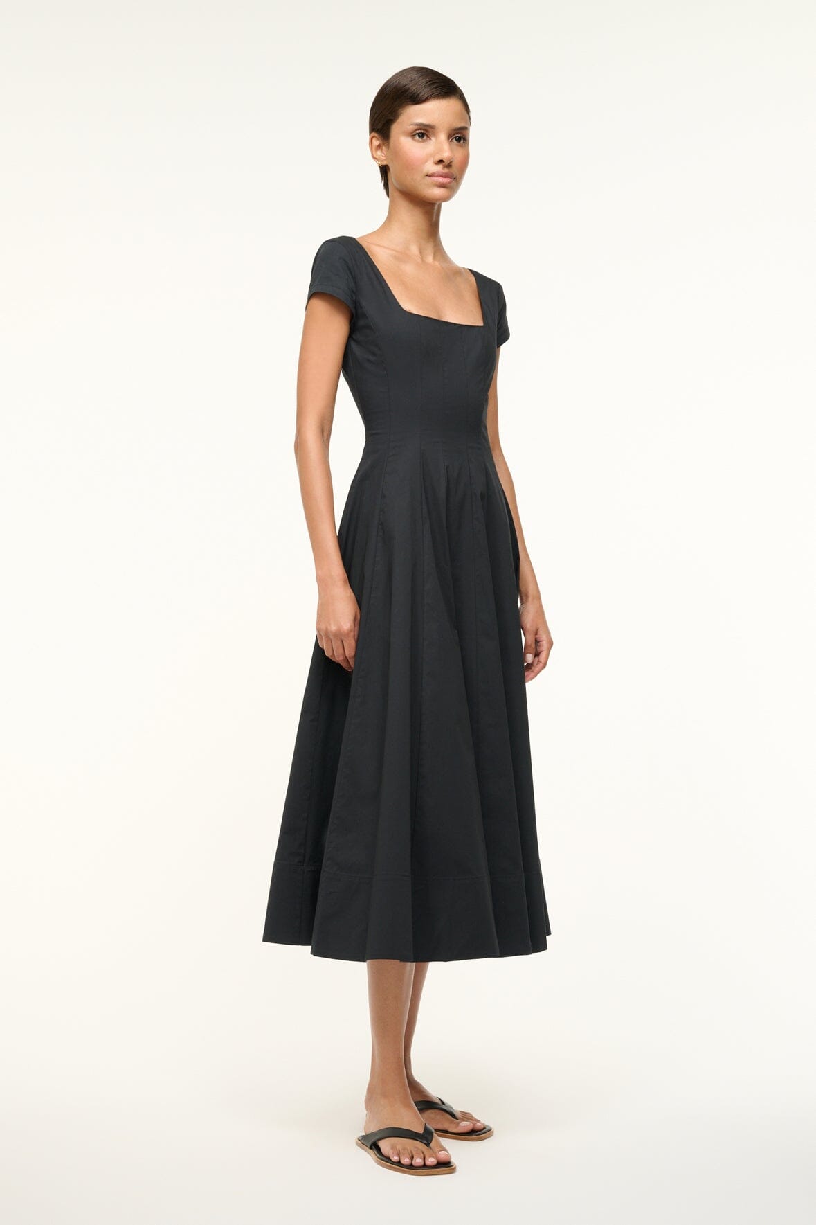 Black short-sleeve midi dress, square neckline, flared skirt with waist gathers
