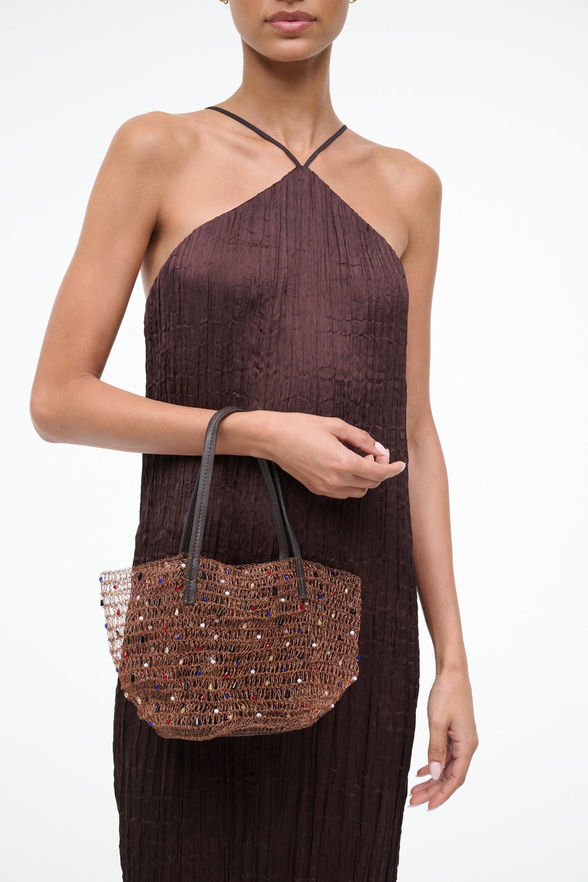 Multi-color beaded bucket bag with textured woven pattern and rope handles