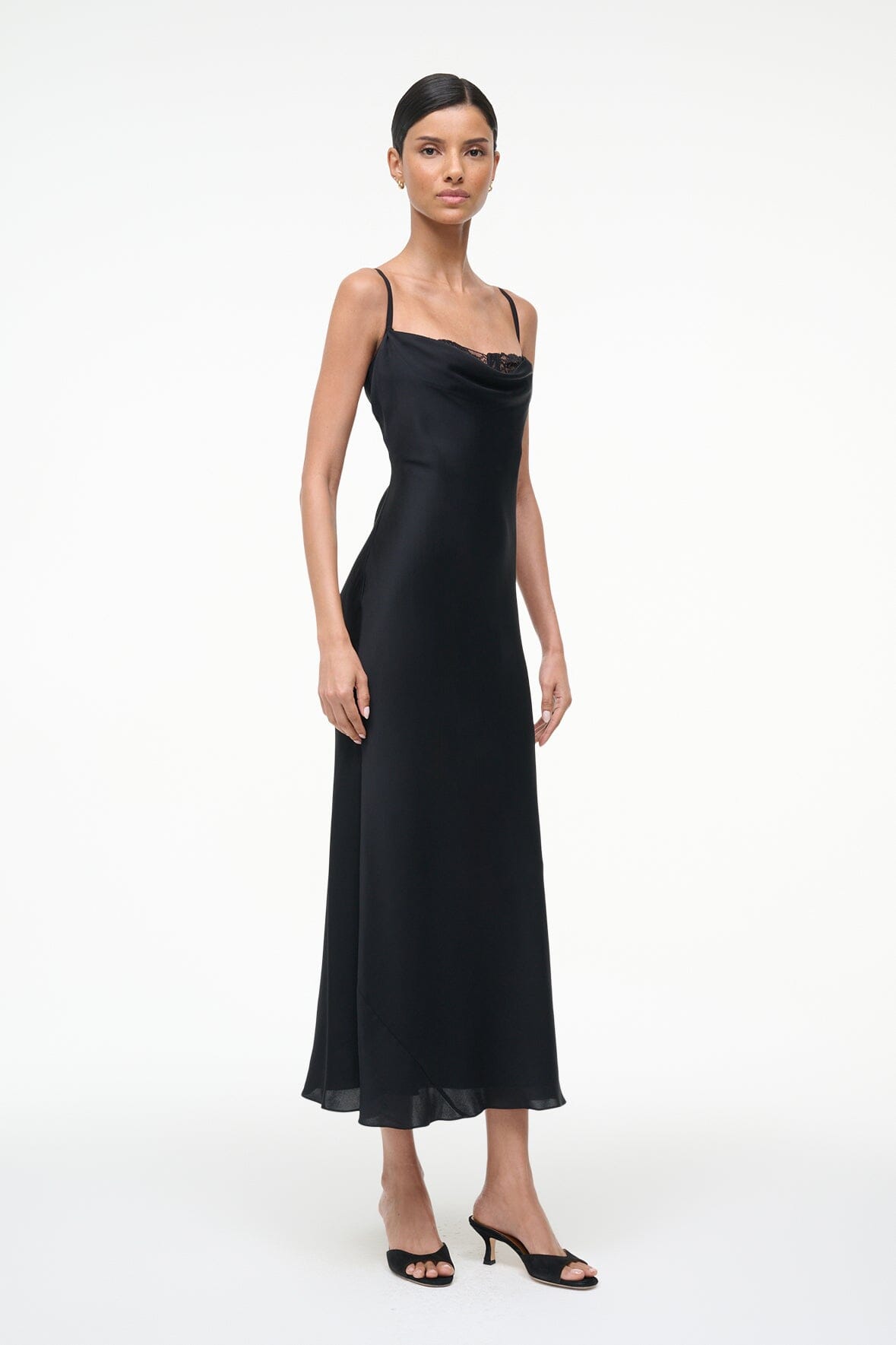 Black silk midi dress front view with lace-trim neckline and bias drape
