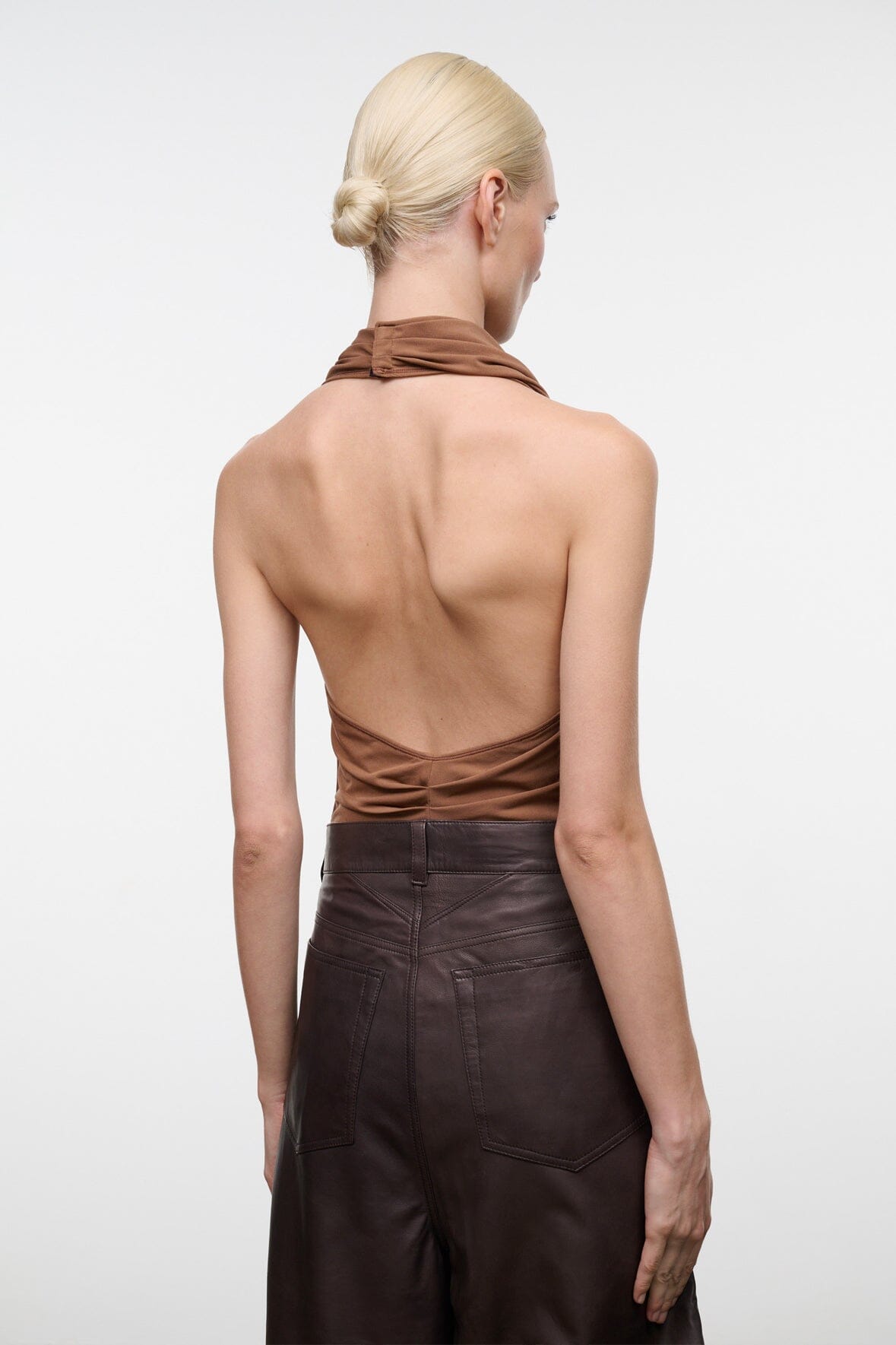 MONAY sleeveless bodysuit, back view with draped halter neck