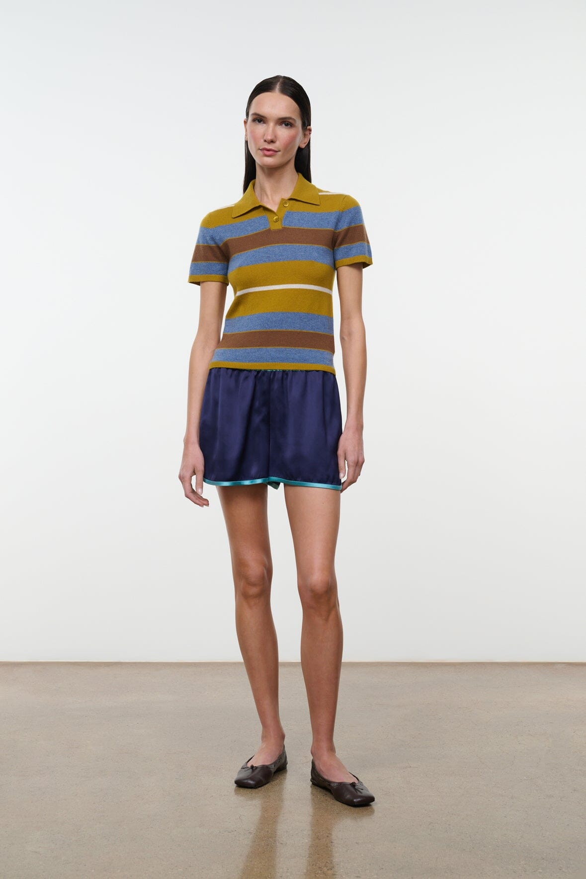 Striped cashmere polo sweater with yellow, blue, and brown bands; short sleeves