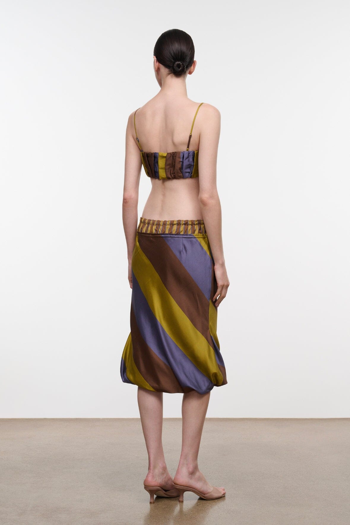Silk midi skirt (back view) with elastic waist and tie, diagonal brown, navy, yellow stripes