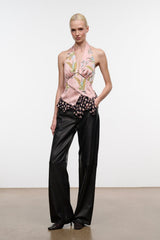 Pink silk halter top with multi-color print, draped neckline and ruffled hem