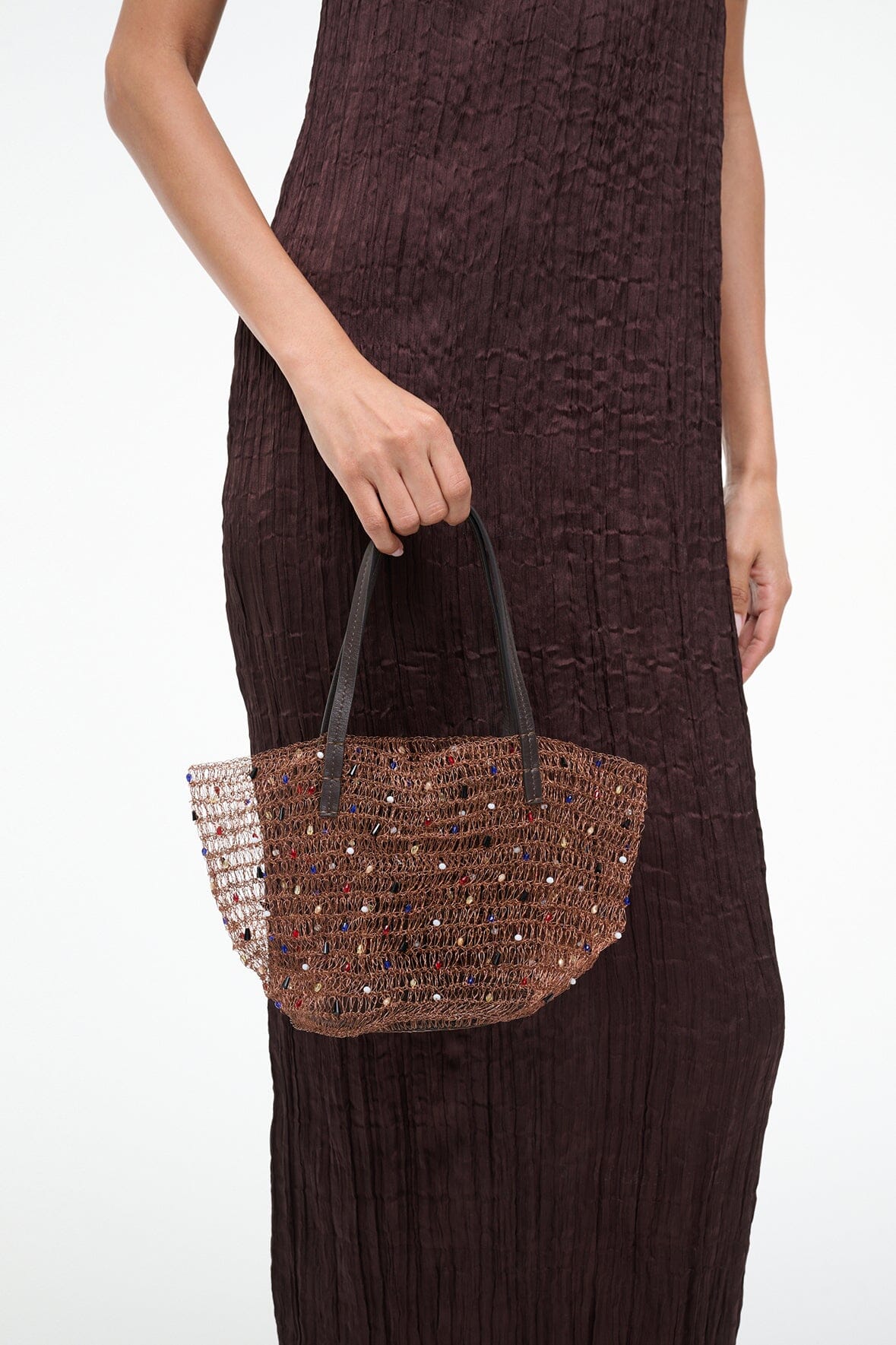 Multi-color beaded bucket bag with open top and rope-like top handles