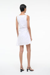 White sleeveless mini dress with draped bodice and fitted waist