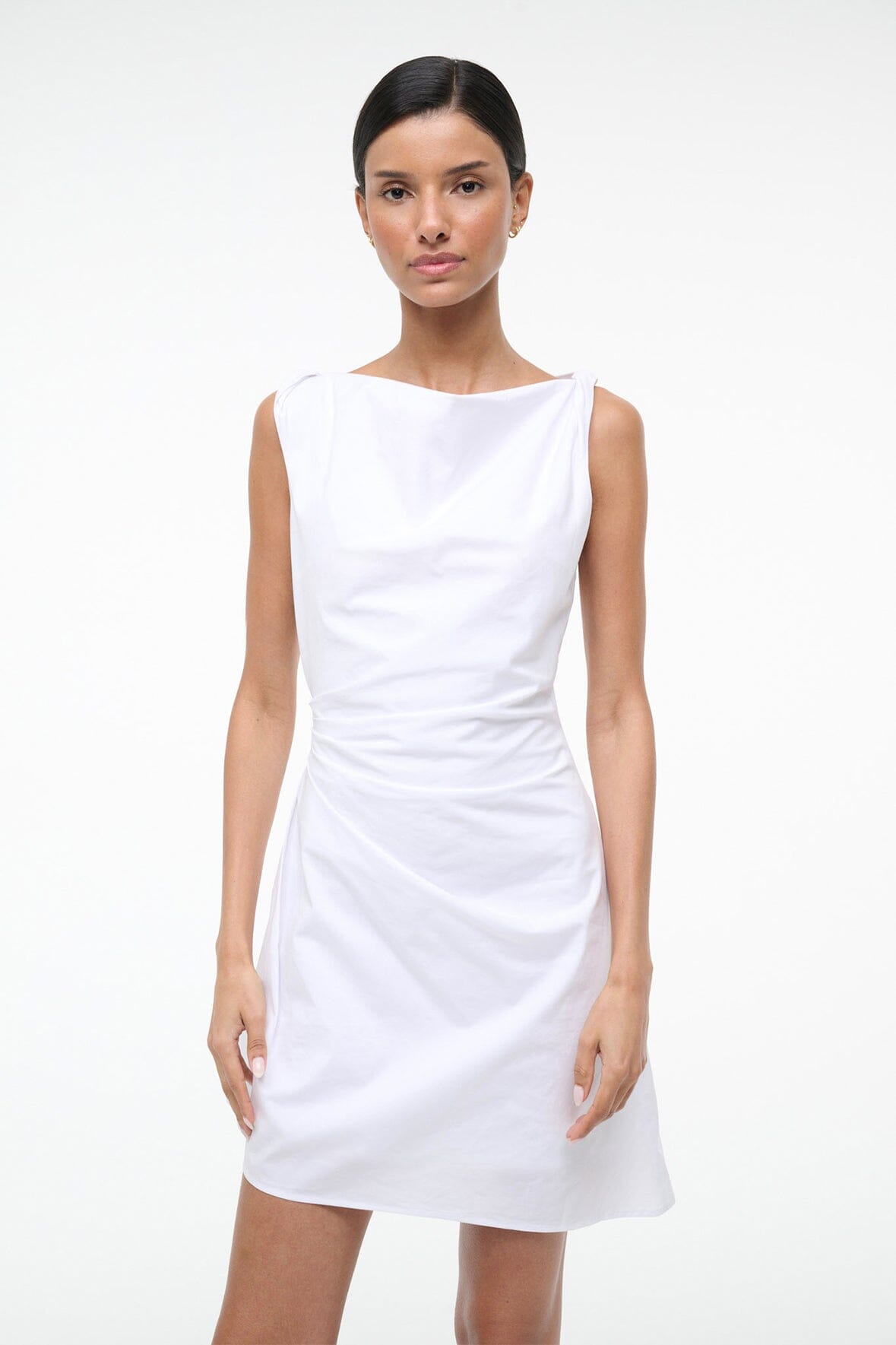 White sleeveless mini dress with boat neckline and gathered waist