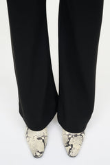 White snake-print ankle boots with low heel and pointed toe