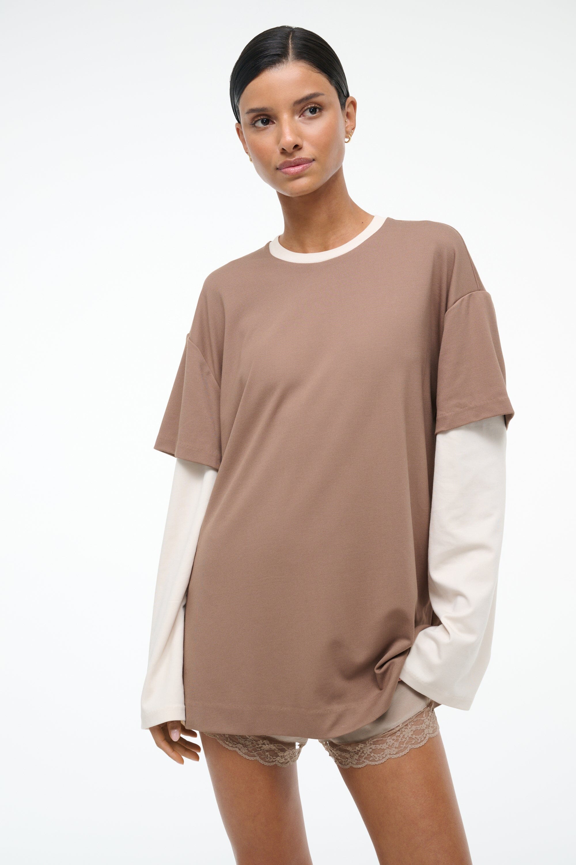 Taupe short-sleeve tee with lace-trim hem and white long-sleeve underlayer, front view