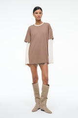 Taupe oversized short-sleeve tee with lace-trim hem and visible white long-sleeve underlayer