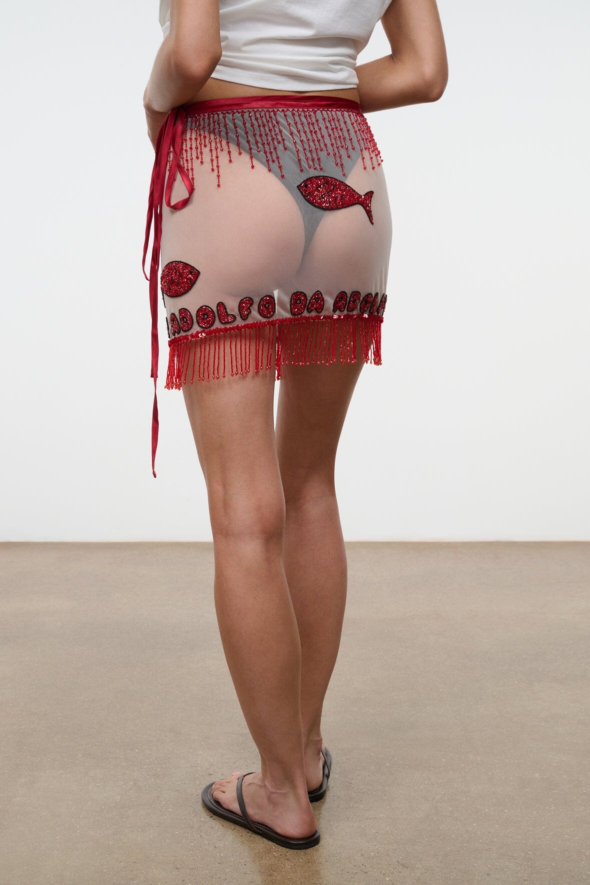 RIVA skirt by DA ADOLFO, red sheer mini skirt with beaded fringe and dangling ties