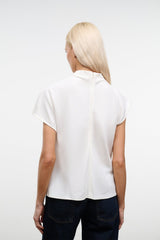 Ivory top with high back neck and wide short sleeves, relaxed fit