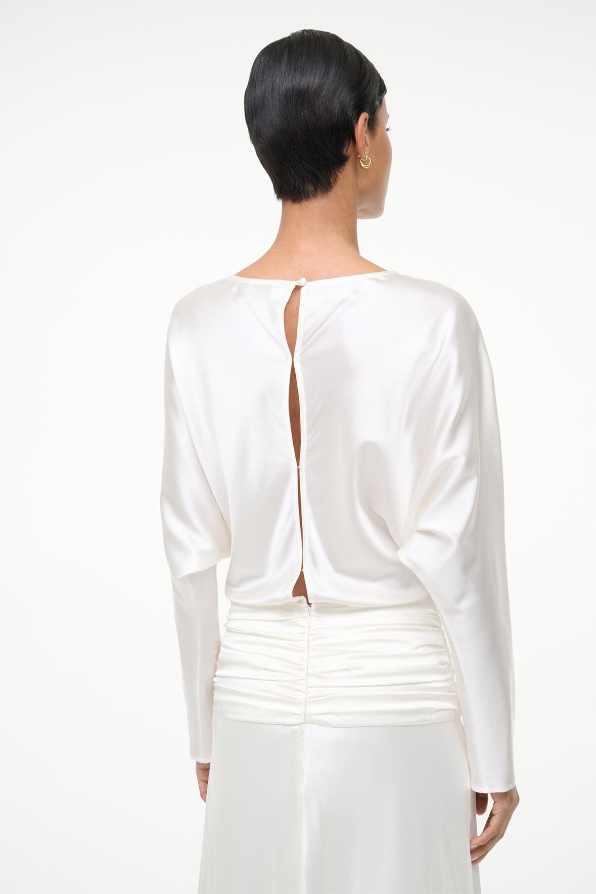 Ivory silk midi dress with open back and ruched waist detail