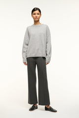 Heather grey cashmere crewneck sweater with long sleeves and ribbed cuffs