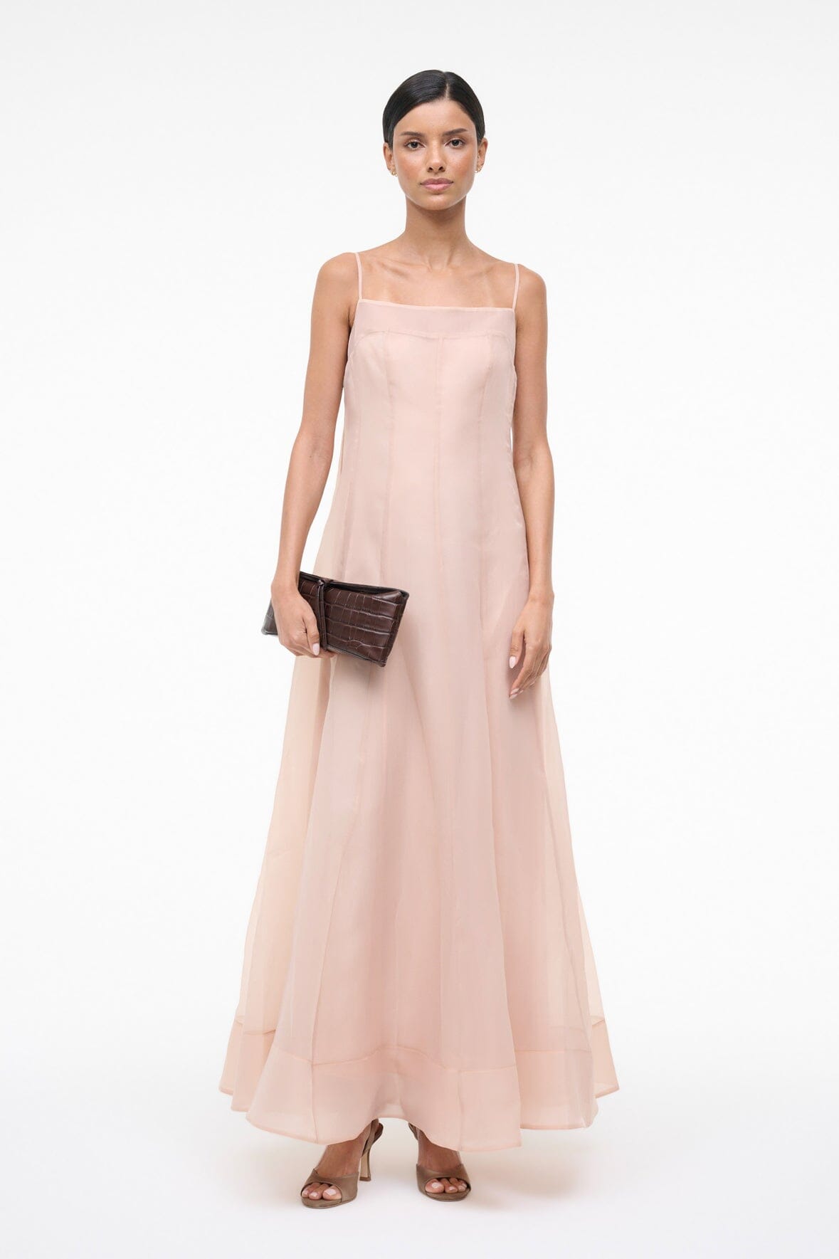 Fawn sleeveless tiered maxi dress with square neckline, styled with dark clutch