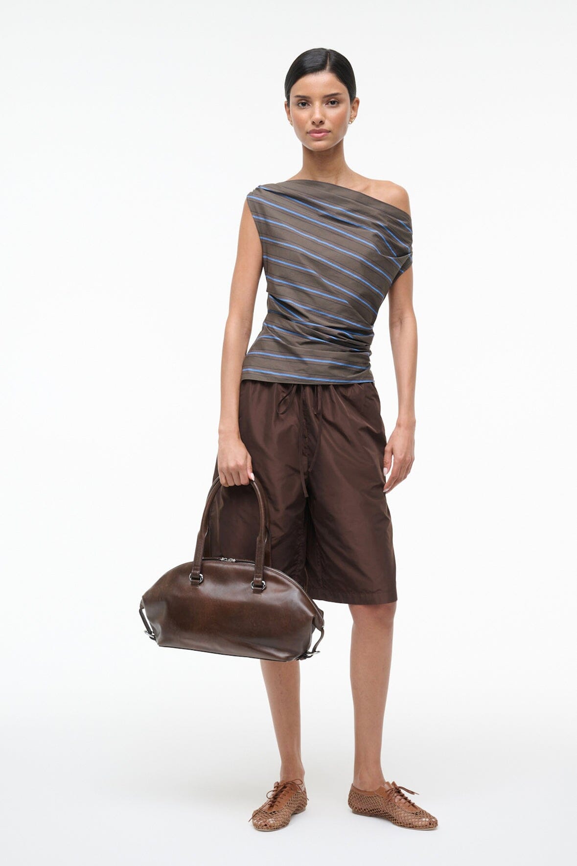Off-shoulder striped draped top with ruched waist, dark with blue stripes