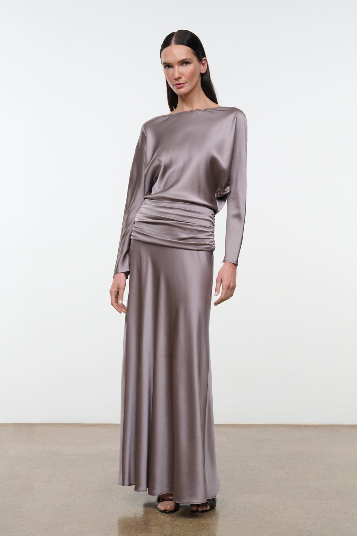 Silk dress in zinc with long sleeves, draped waist ruching, floor-length skirt