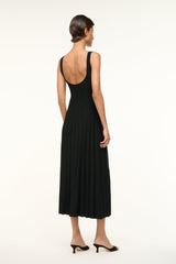 Back view of black sleeveless midi dress with pleated skirt