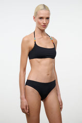 Black bikini bottom with mid-rise waistband and smooth stretch fabric.
