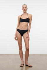 Black bikini bottom with simple waistband and minimal coverage.