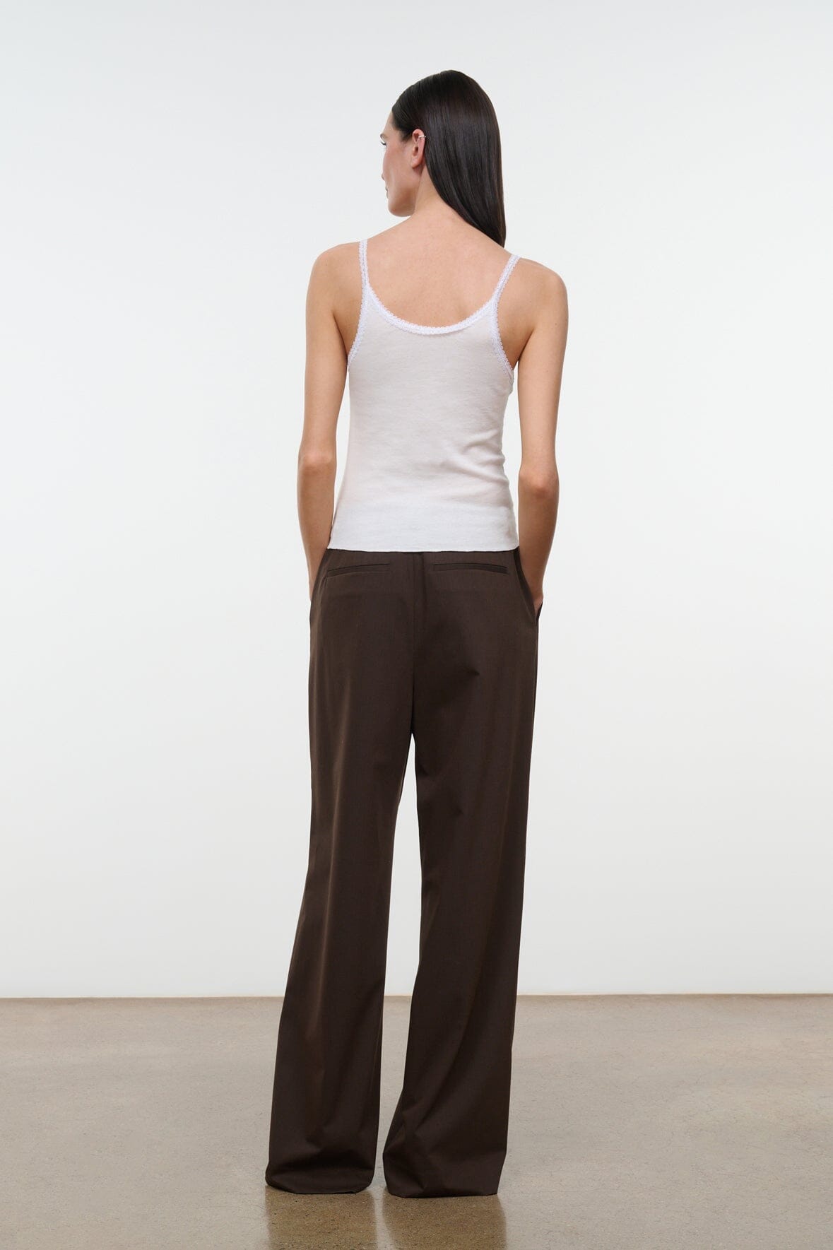 Dark brown wide-leg trousers with high waist and back seam