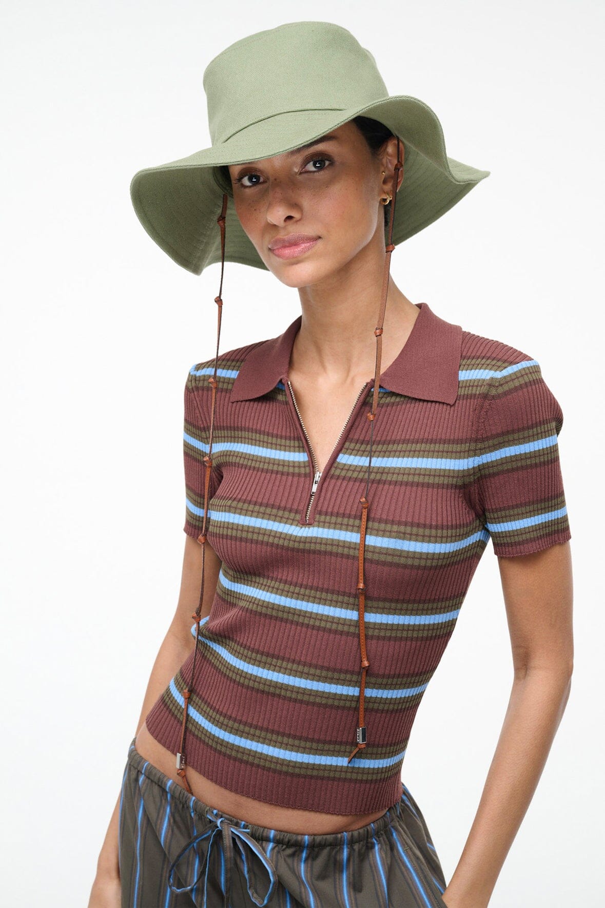 Fern green COAST bucket hat with wide brim and chin cord ties