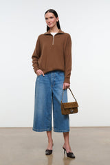 Cigar-brown suede handbag on shoulder strap with fringe trim and buckle clasp