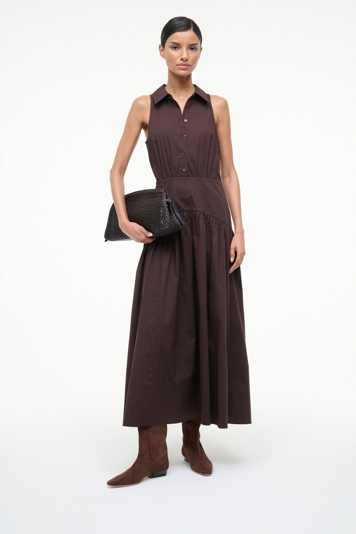Wally flat suede boots in mahogany brown, worn with a sleeveless dress; side view.