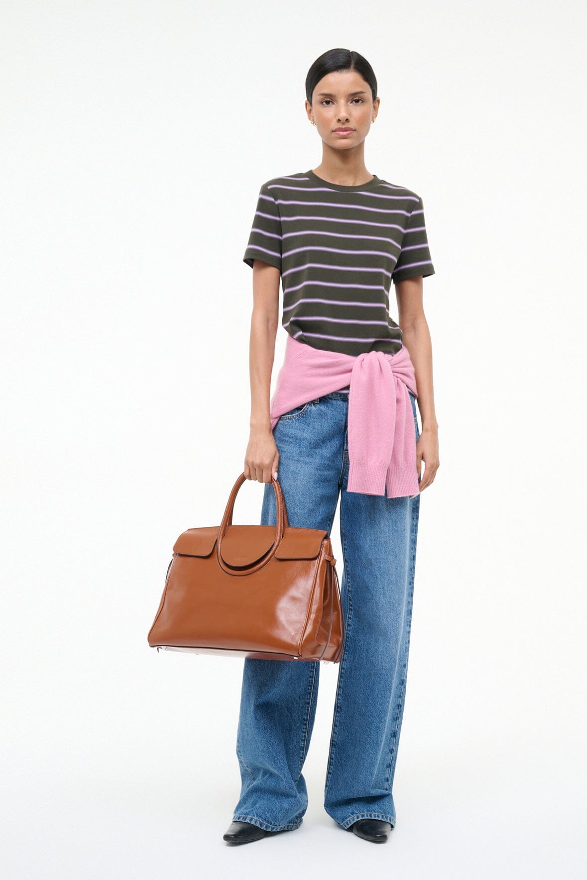 Brown leather-look carryall handbag with top handles and front pocket flaps