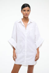 White NICO shirt dress with V-neck, button front, and chest patch pocket
