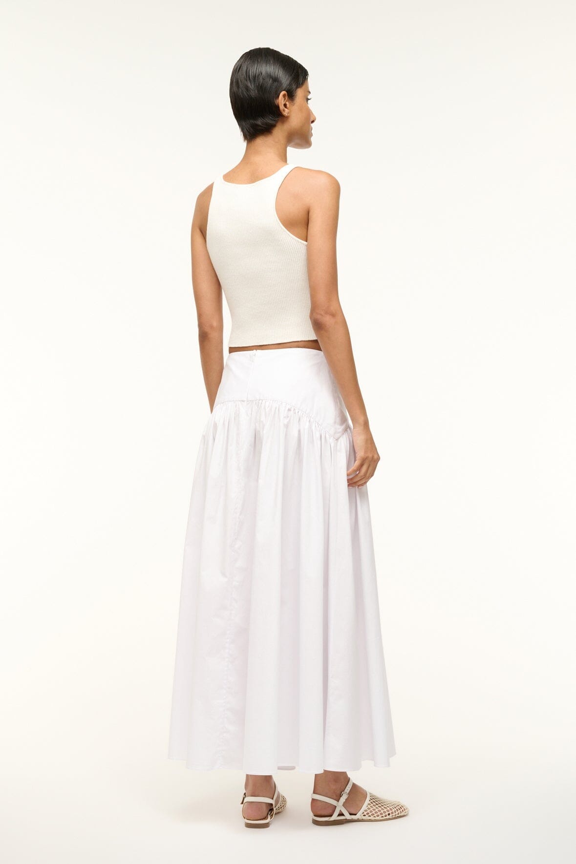 White tiered midi skirt with elastic waistband, side view
