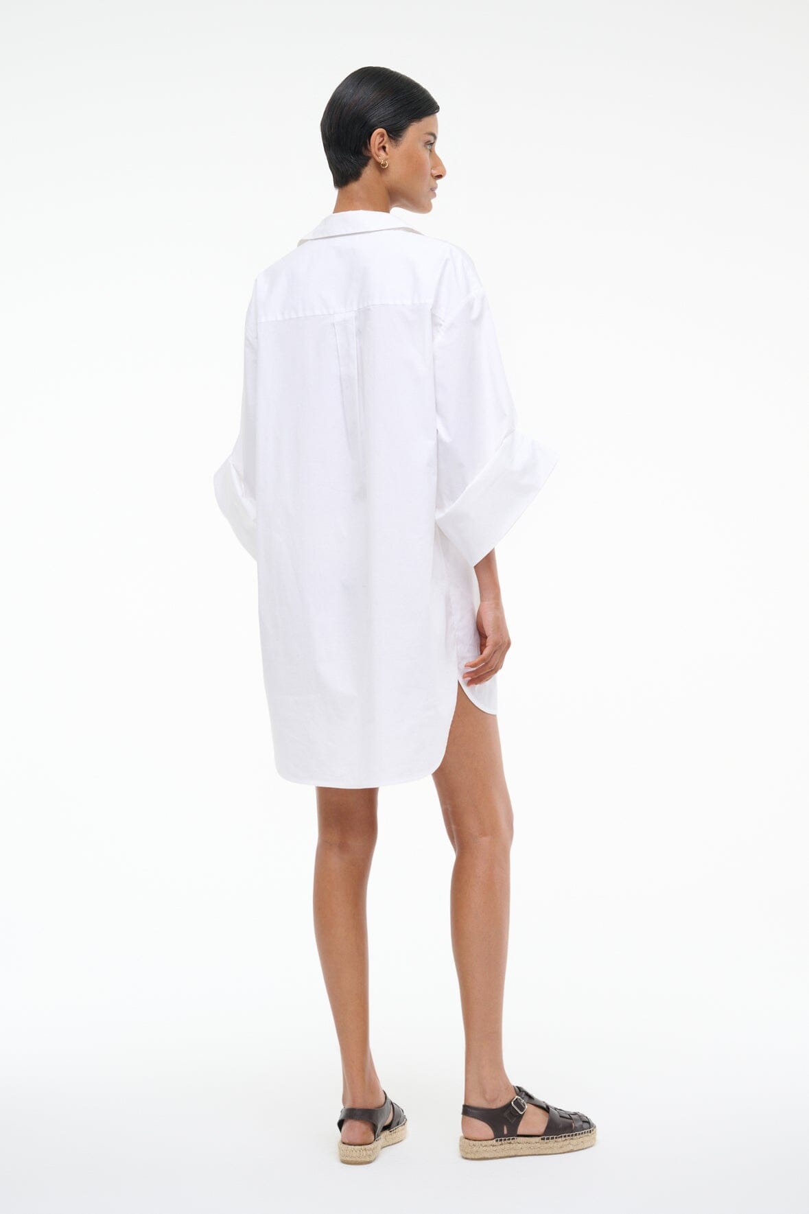 White NICO dress back view with relaxed fit and oversized dolman sleeves