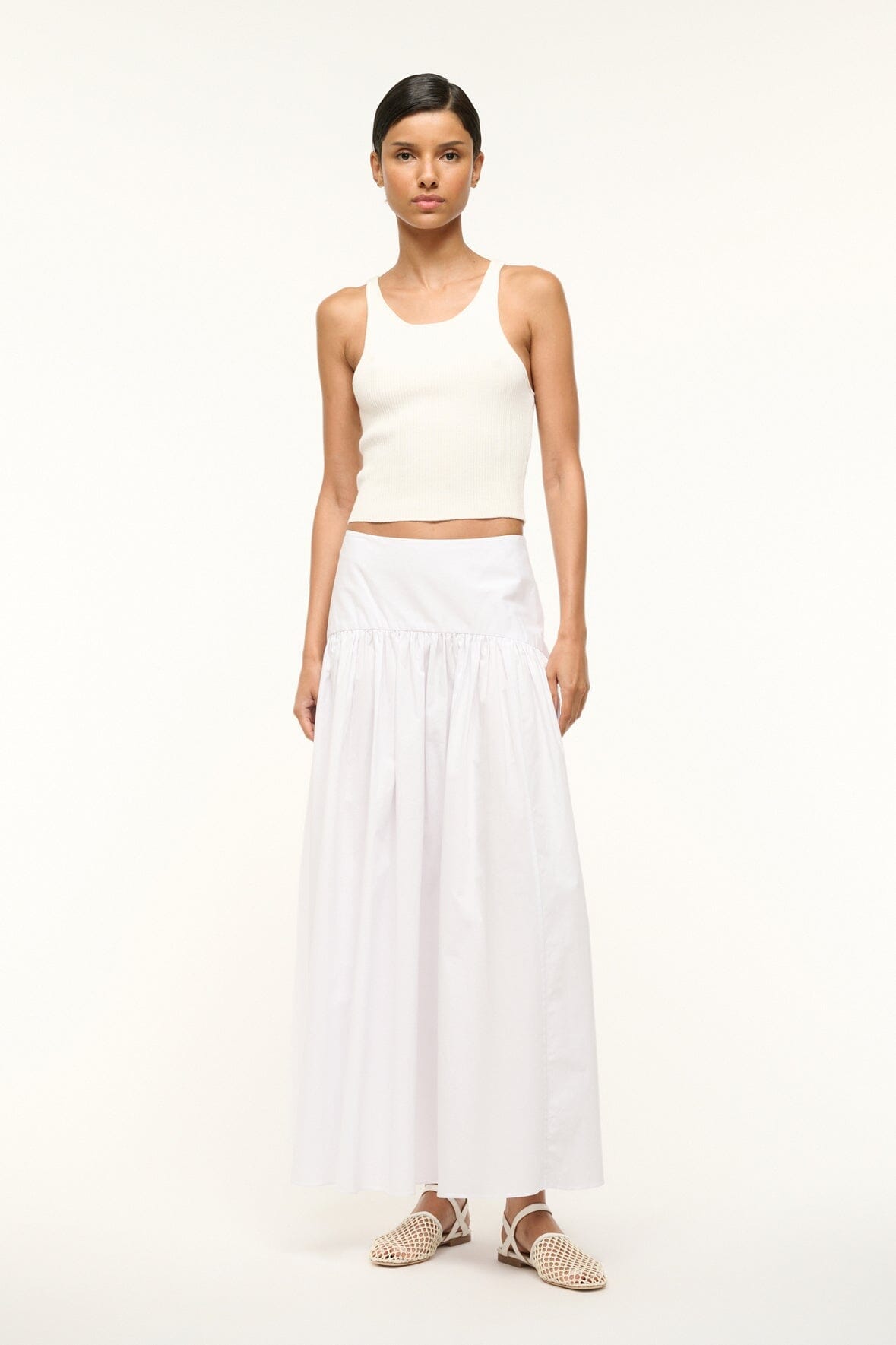 White tiered midi skirt with elastic waistband, front view