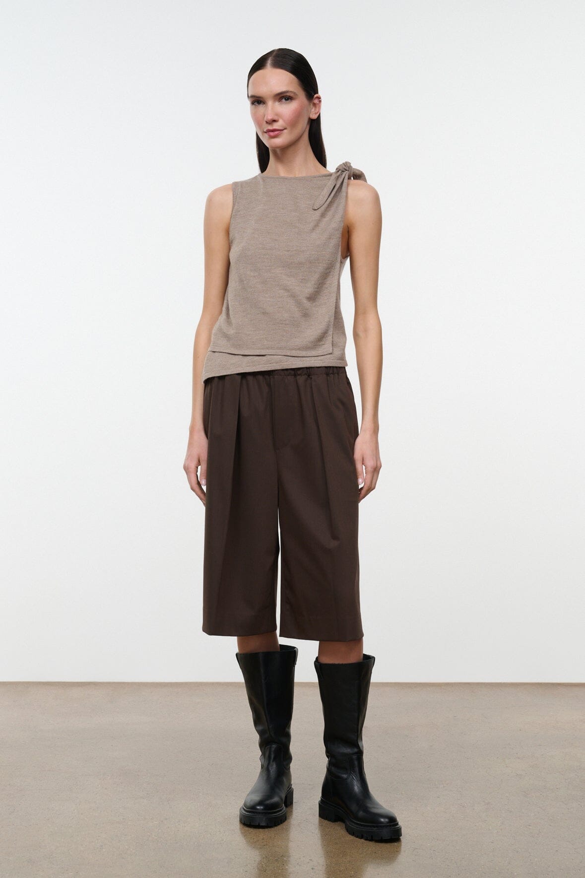 Dark brown wide shorts with gathered elastic waistband and straight hem