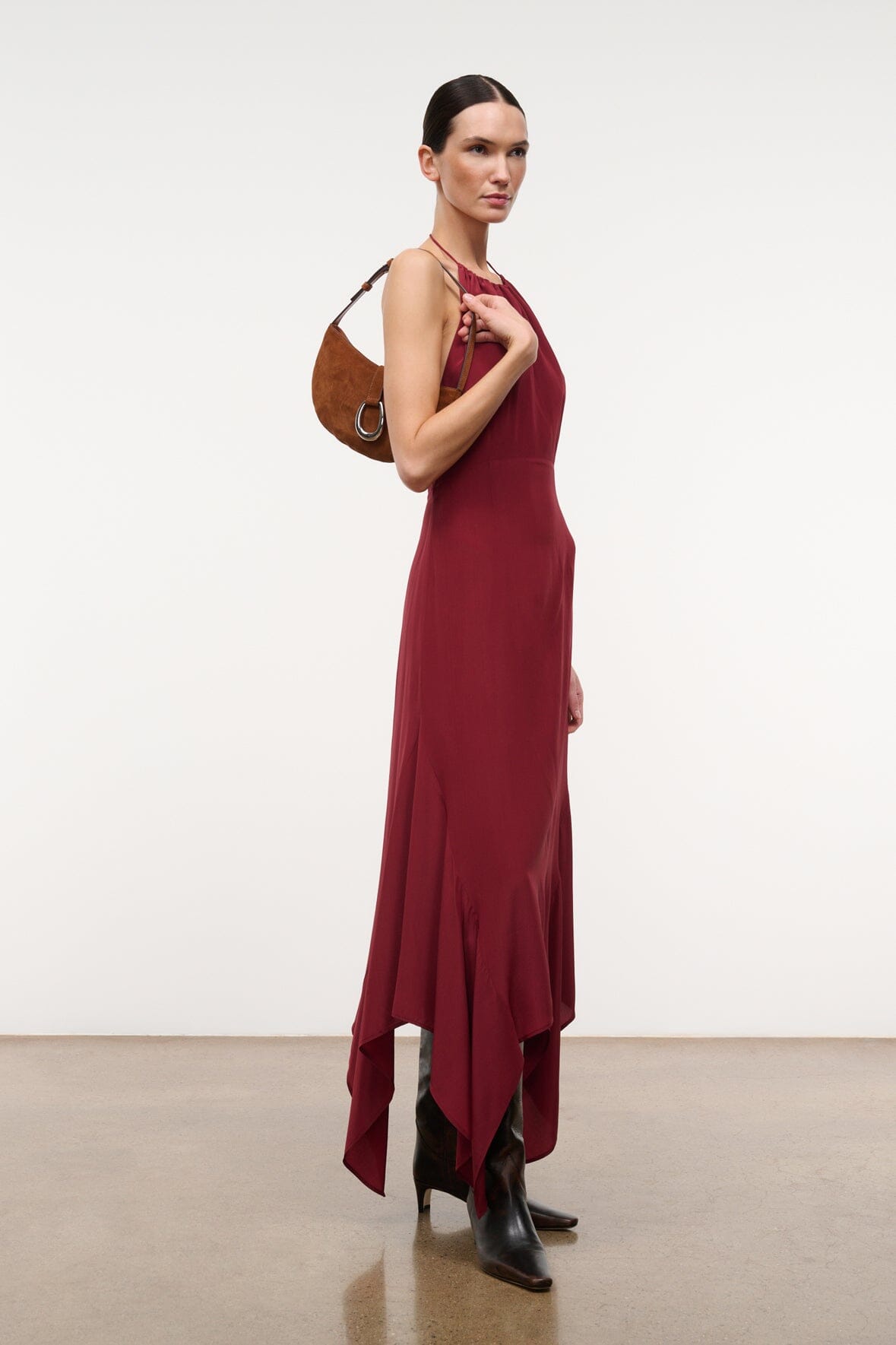Tabac suede shoulder bag with ring clasp, side view on model