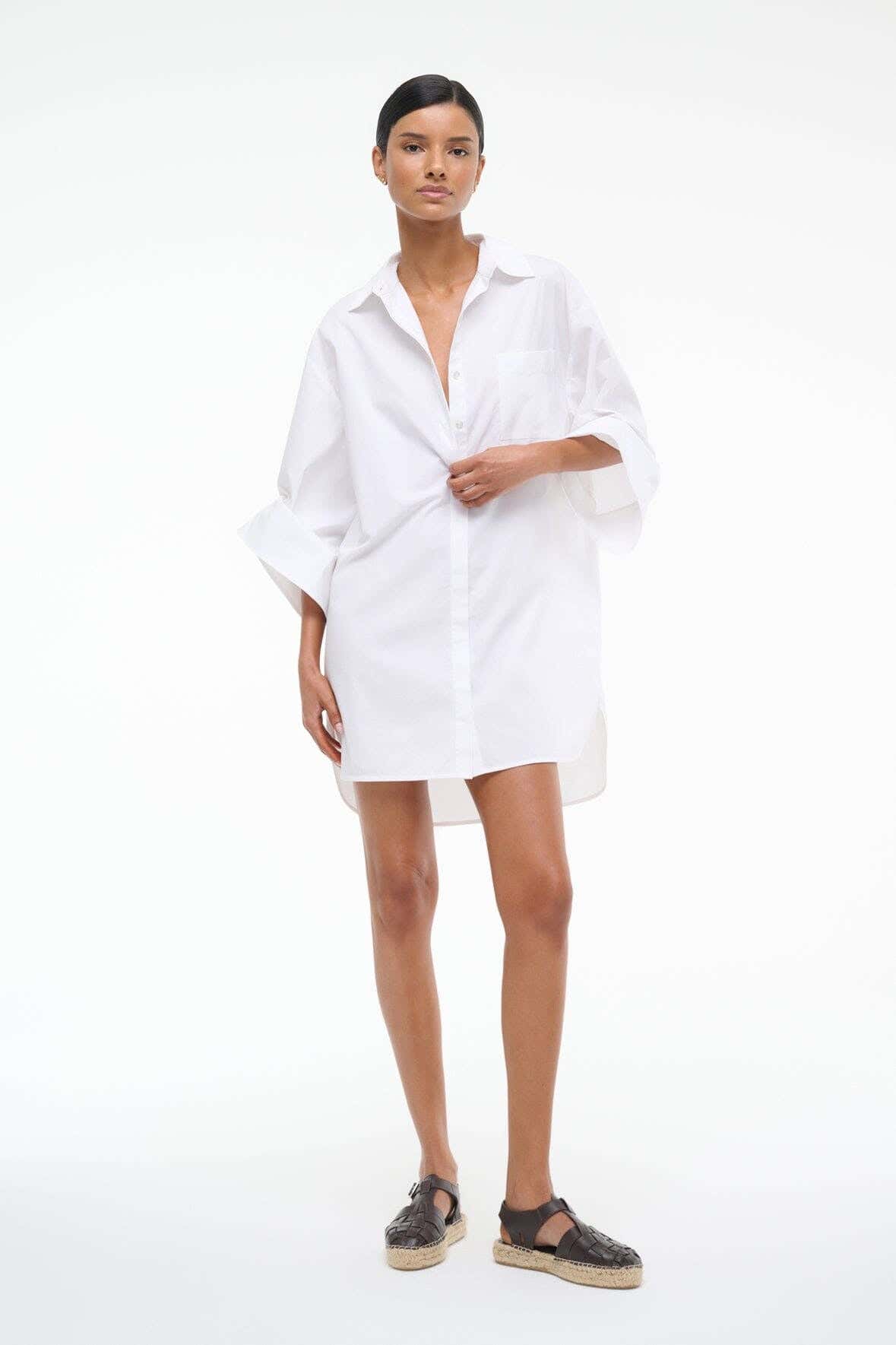 White NICO dress with button-up front and wide cuffed sleeves