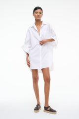White NICO dress with button-up front and wide cuffed sleeves