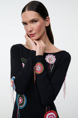 Black long-sleeve dress with colorful dreamcatcher embroidery, round neckline