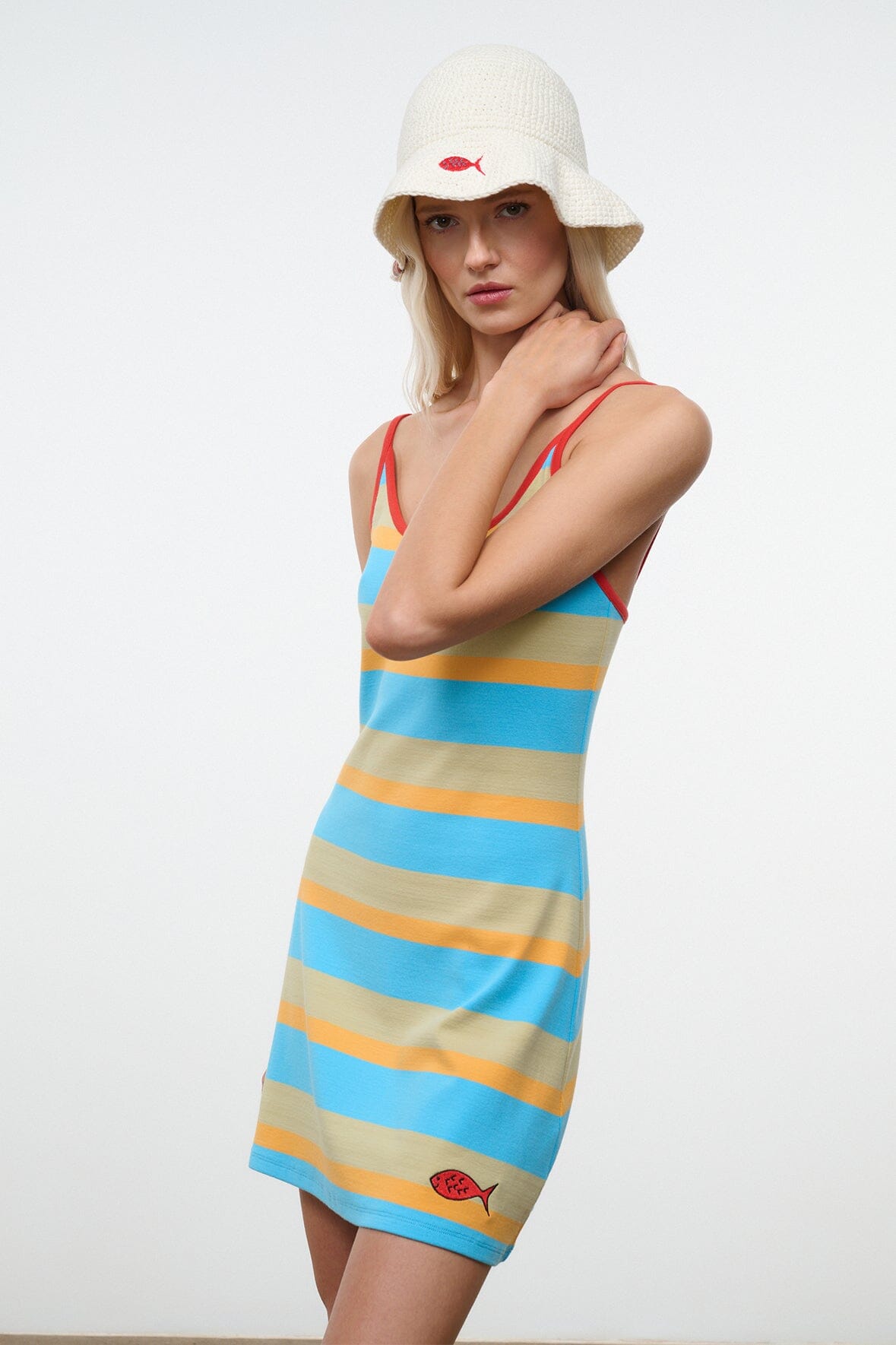 Sleeveless striped mini dress with red trim, blue and yellow horizontal bands