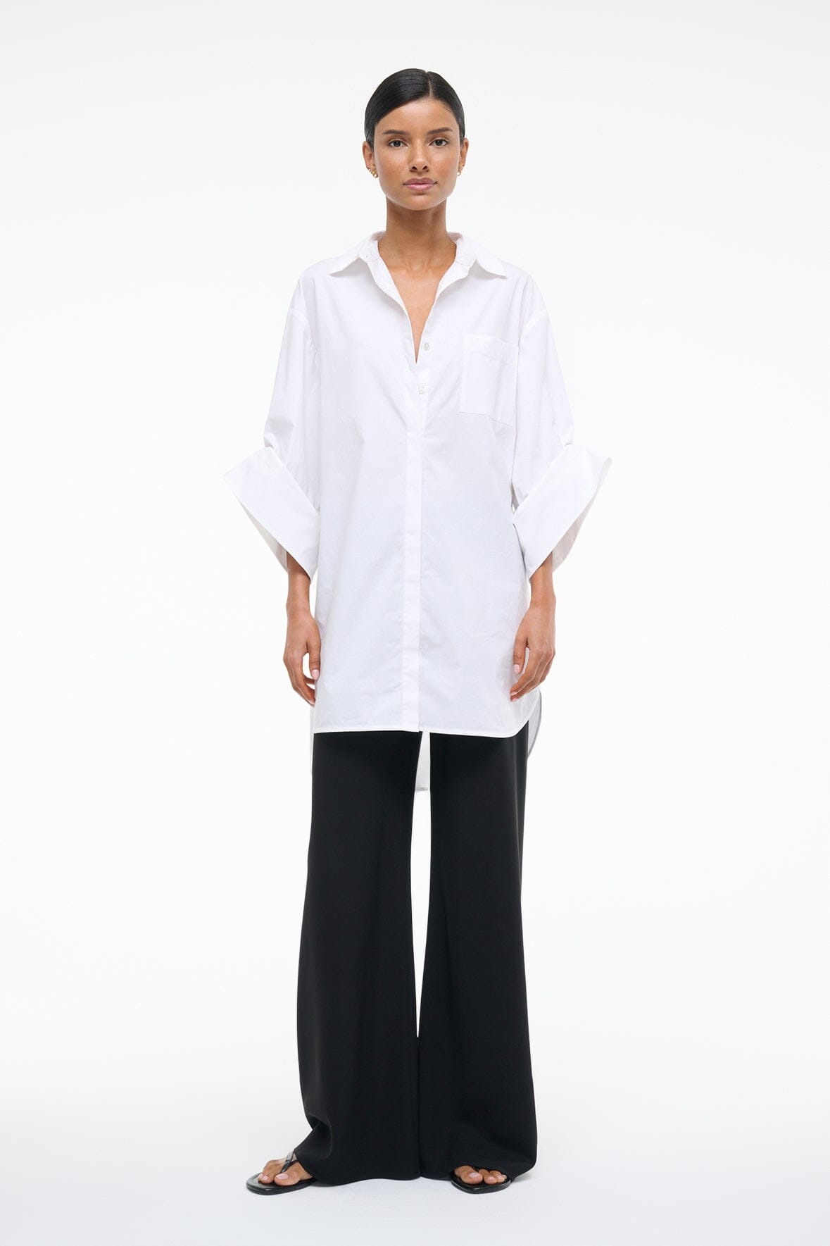 White NICO shirt dress with open collar, button front, and short straight hem