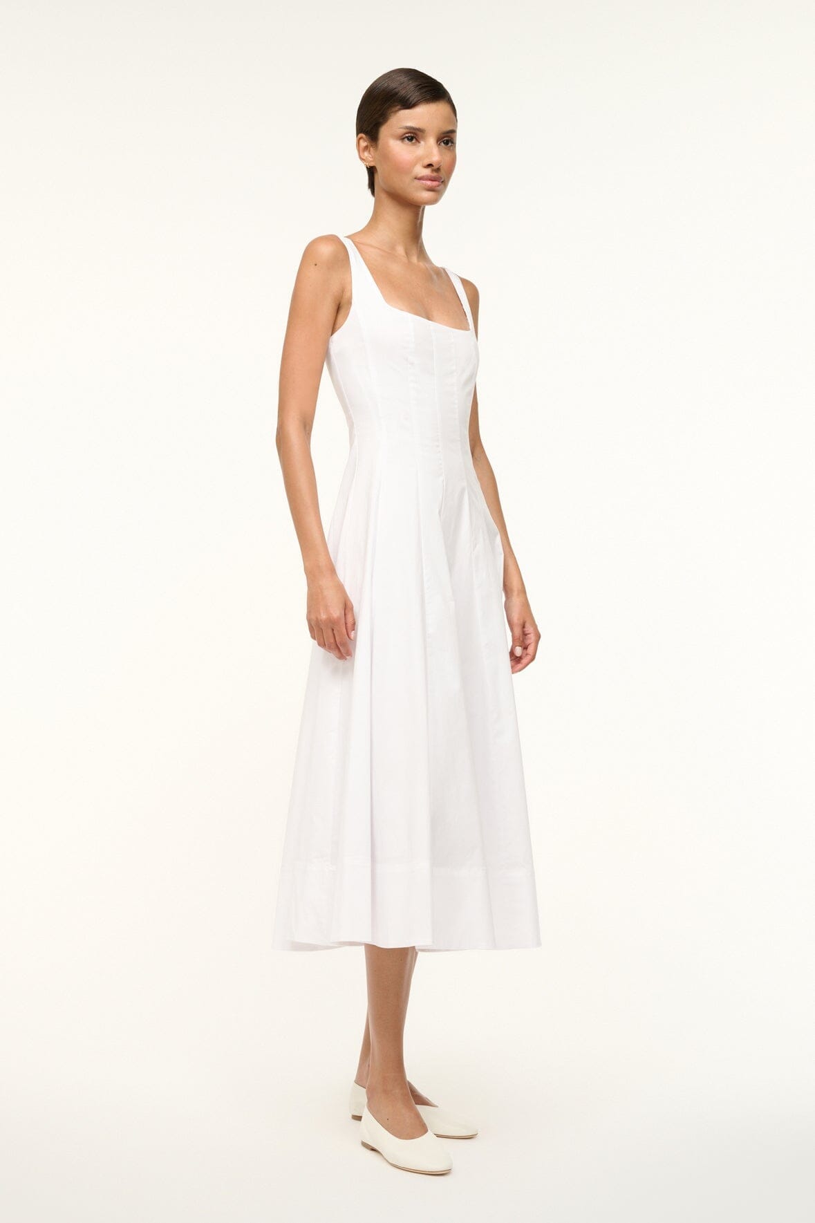 White sleeveless midi dress with square neckline and gathered waist