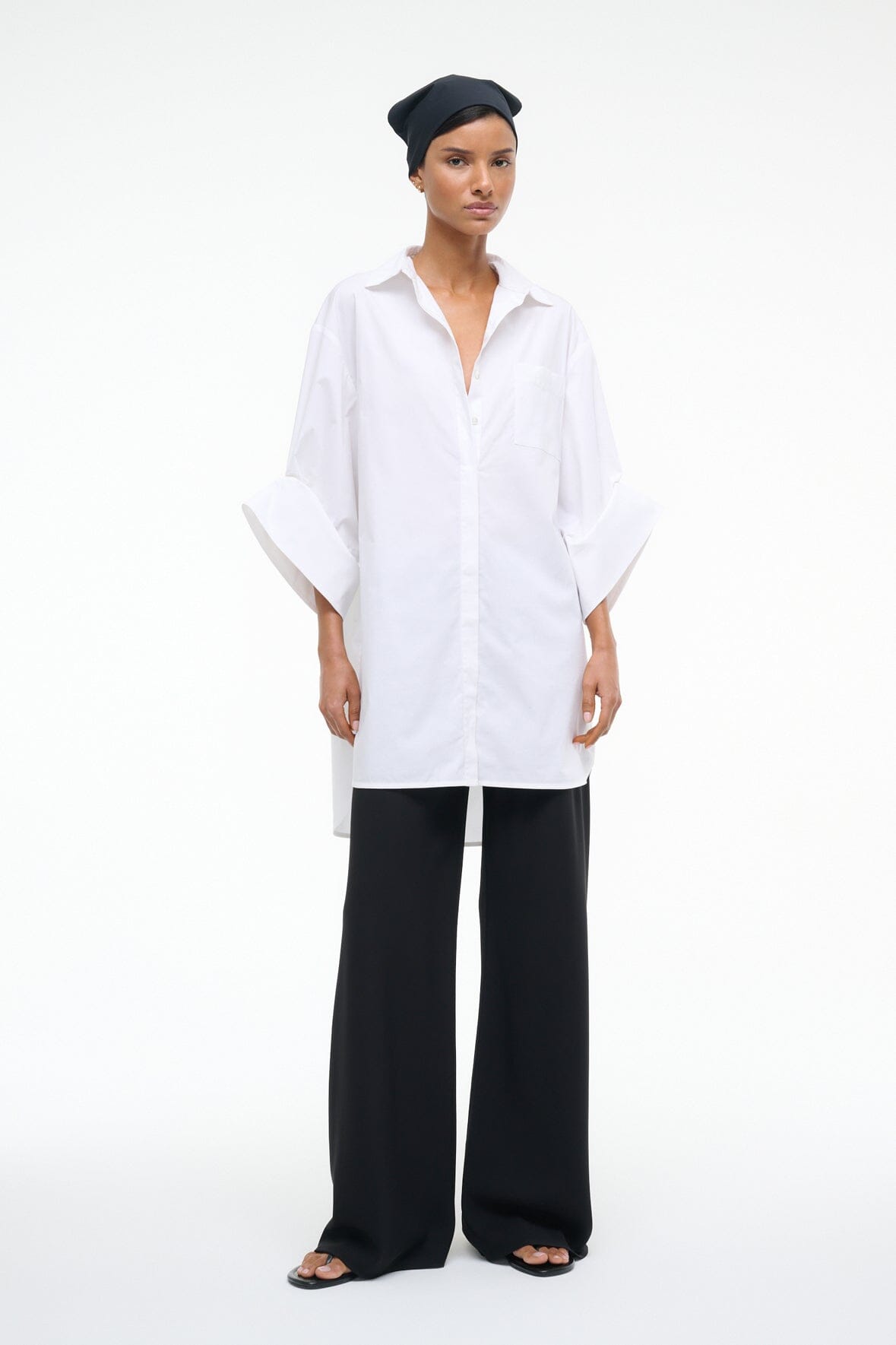 White NICO dress with collar and button front, relaxed oversized sleeve openings