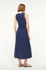 ELYSE navy sleeveless midi dress, back view with gathered pleated skirt