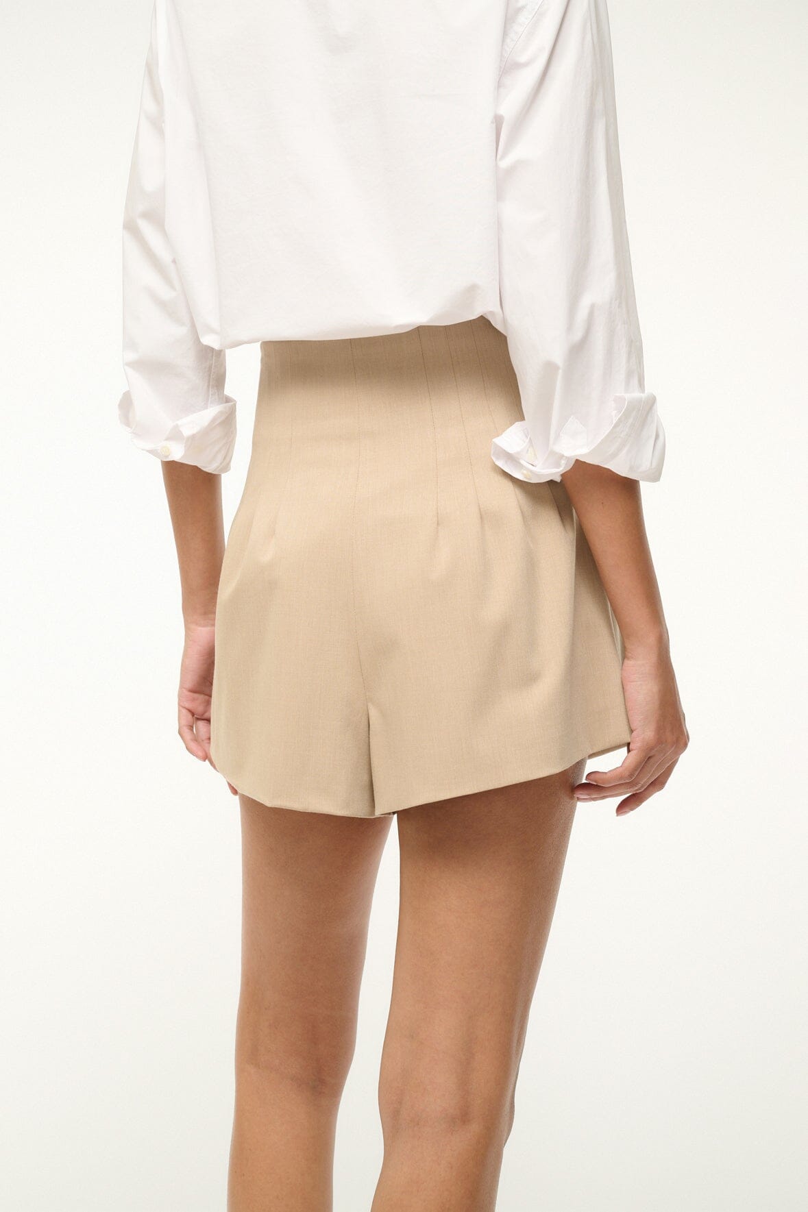 Women’s stone-tan shorts with pleated front and relaxed cuffed hem